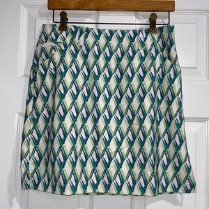 NVo Skort Size 4 Golf Pickleball Athletic
Green multi